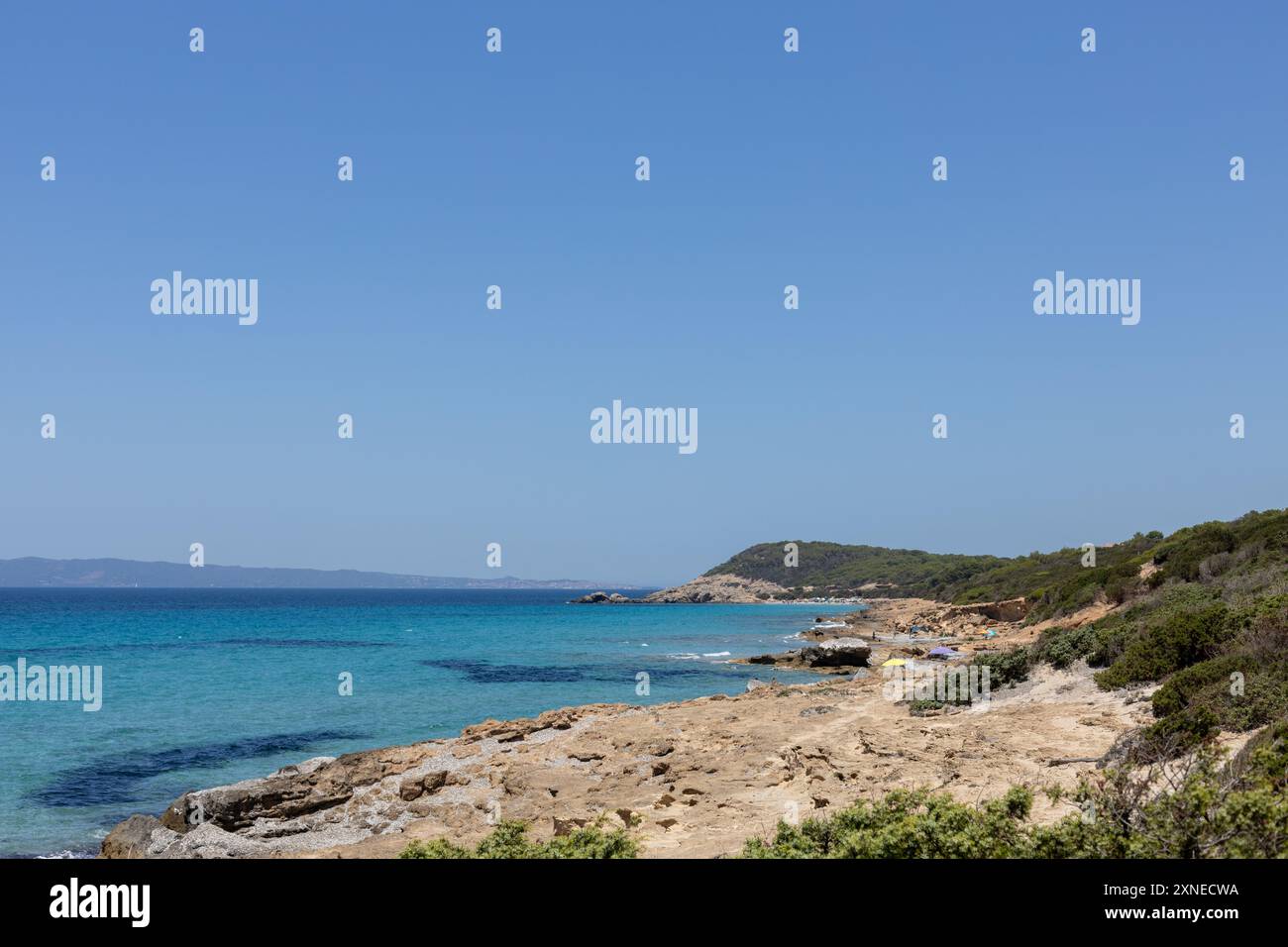 Rocky Beach with Crystal Clear Water Stock Photo - Alamy