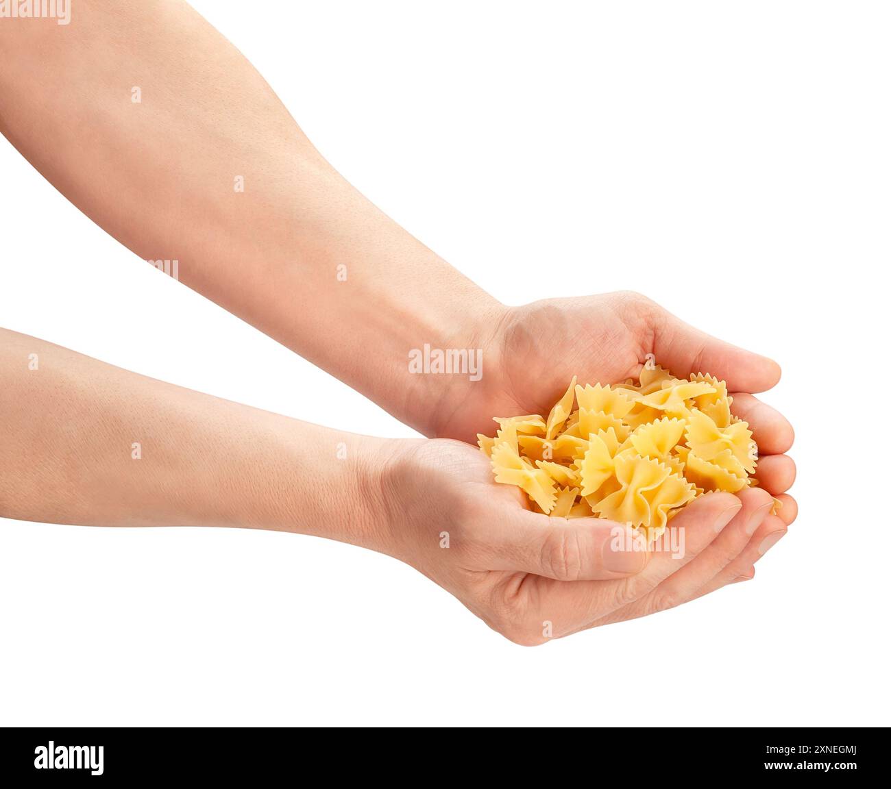 pasta farfalle in hand path isolated on white Stock Photo