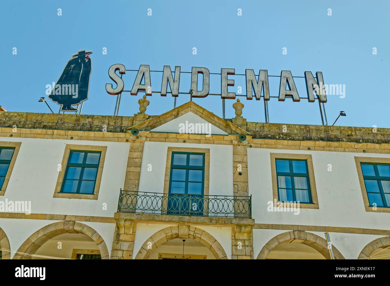 The Sandeman cellars on the south bank of the River Duoro in the Vila Nova de Gaia district of Porto, Portugal. Stock Photo