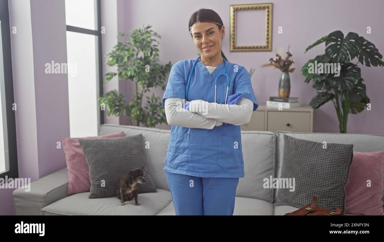 Woman in blue scrubs stands hi-res stock photography and images - Alamy