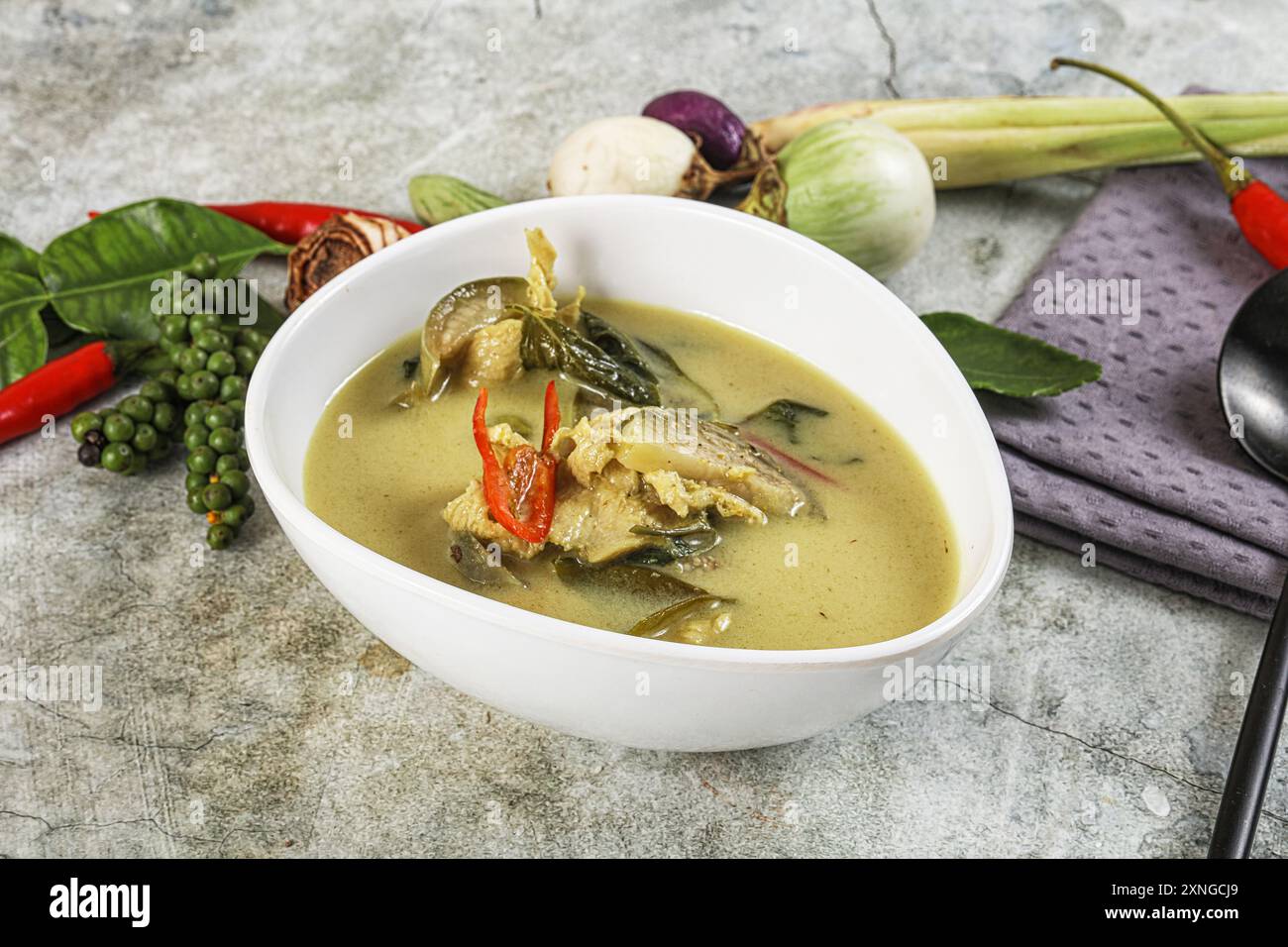 Thai green chicken curry with coconut milk and basil Stock Photo - Alamy