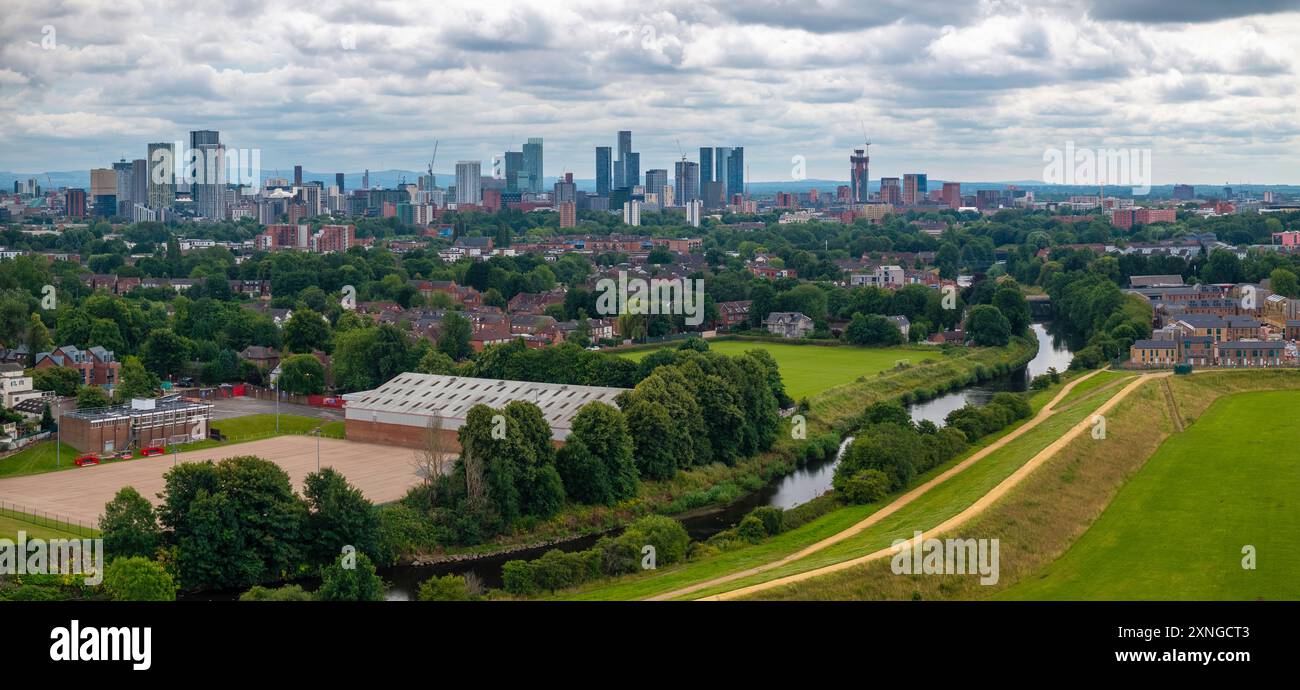 Aerial view of Manchester cityscape with skyscrapers and construction ...