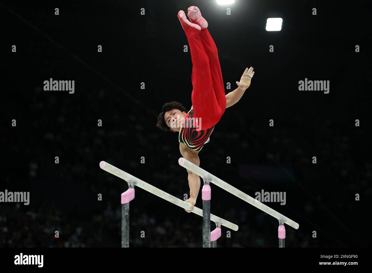 PARIS, FRANCE - JULY 31: Shinnosuke Oka of Japan competes on the parallel bars during the men's artistic gymnastics individual all-around final on day five of the Olympic Games Paris 2024 at Bercy Arena on July 31, 2024 in Paris, France. © diebilderwelt / Alamy Live News Stock Photo