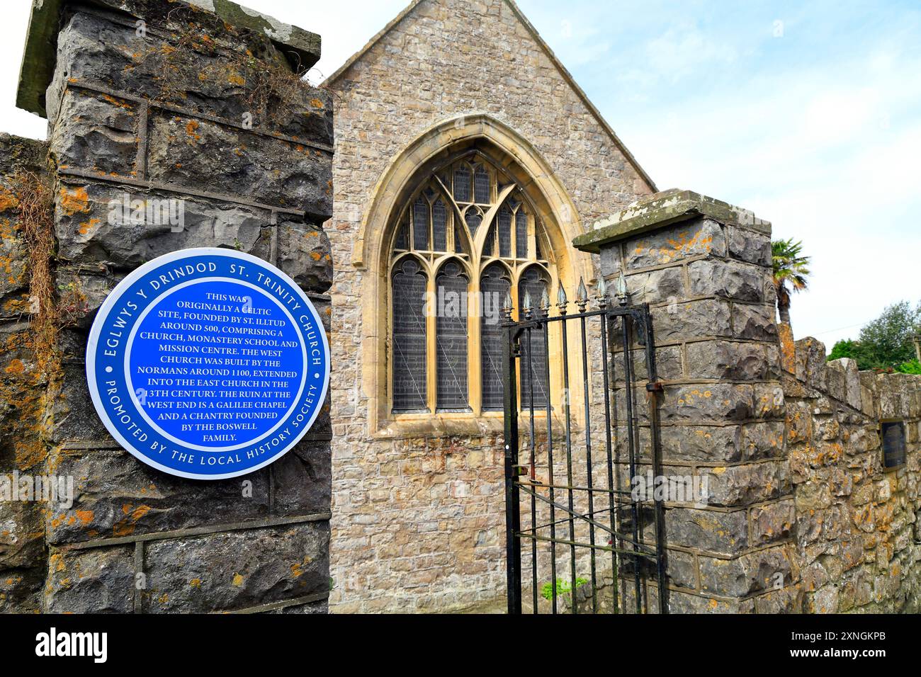 St. Trinity church - Fake blue plaque on St Illtud's Church, Llantwit Major. South Wales for filming of Death Valley TV series.Taken July 2024. Summer Stock Photo