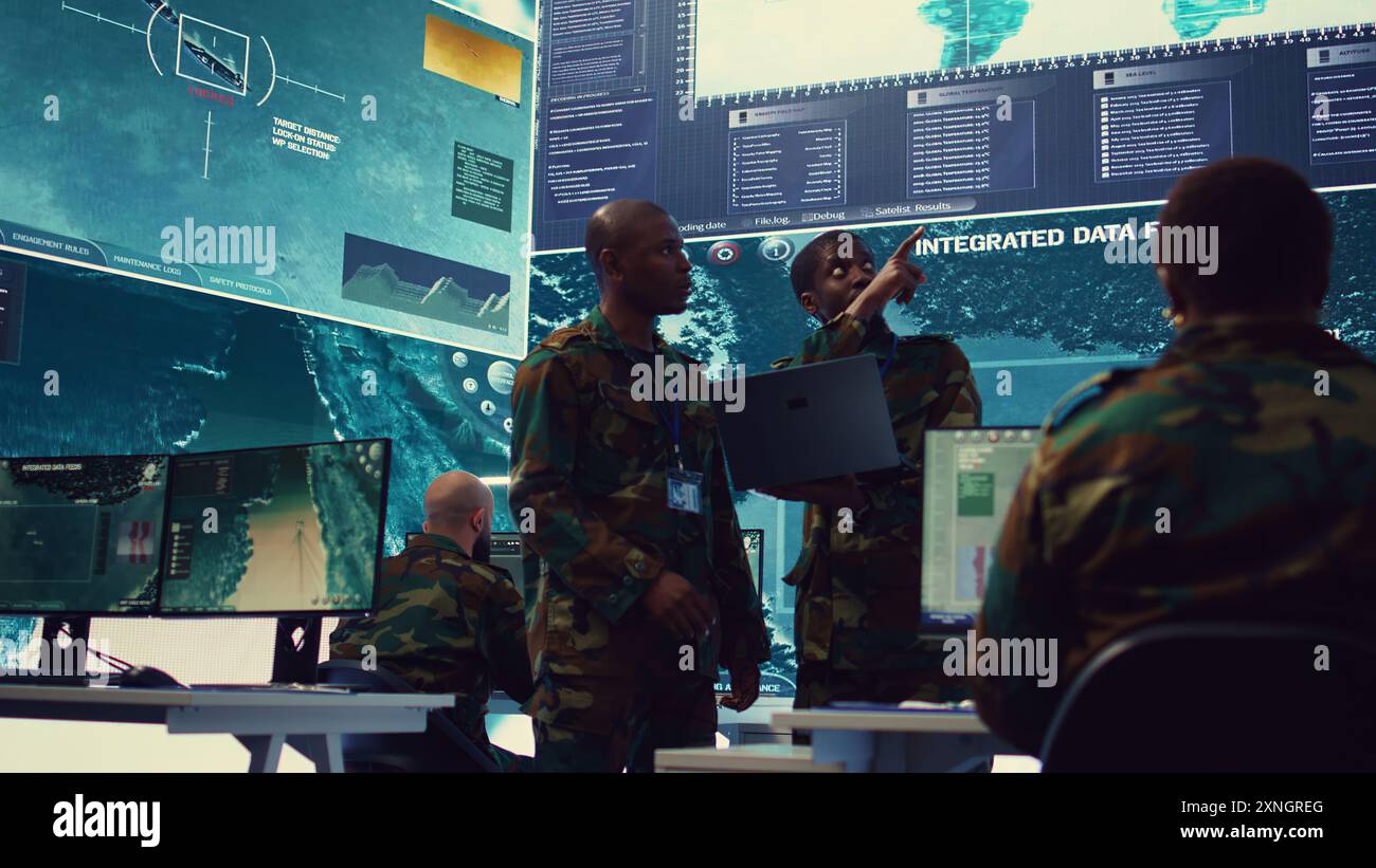 Signal support systems specialists work with battlefield data and ...