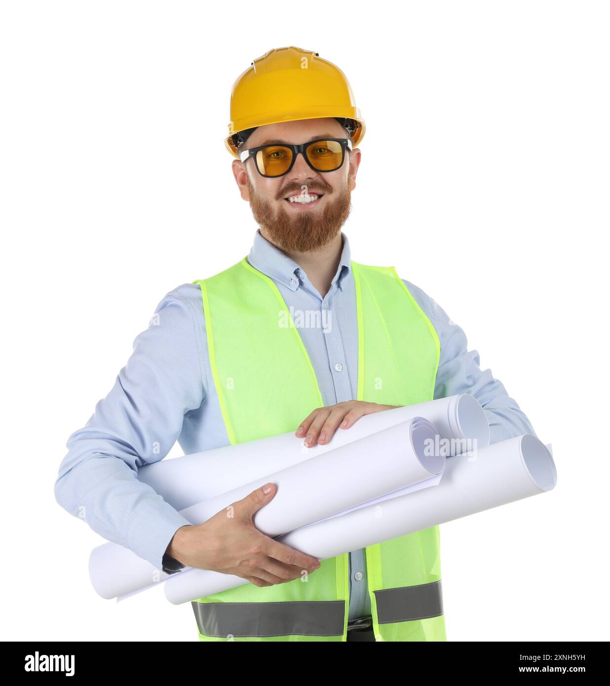 Engineer in hard hat and protective glasses with drafts on white ...
