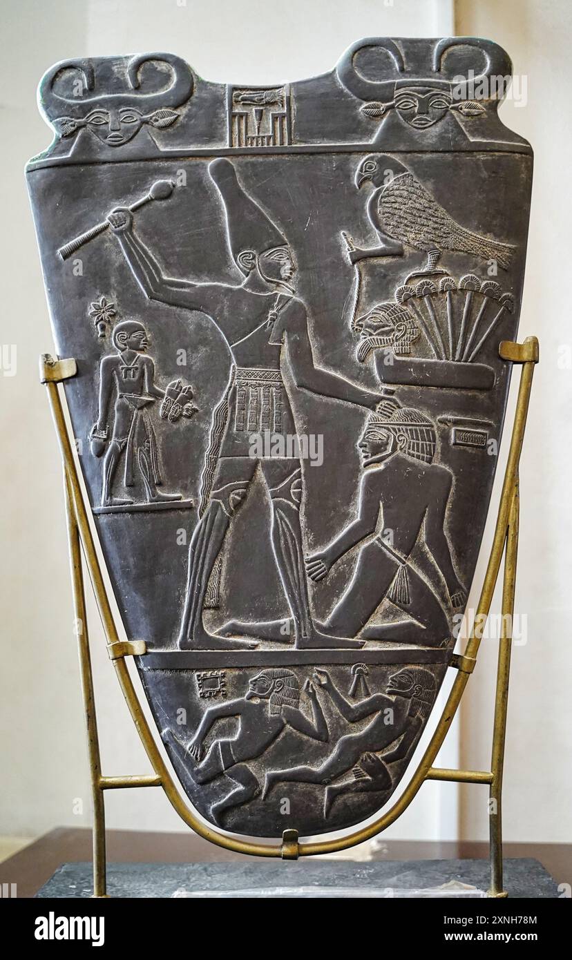 Famous Narmer palette dated to 3100 BC,made out of siltstone,the earliest depiction of a unified Egypt,Pharoah Narmer strking his enemies Stock Photo