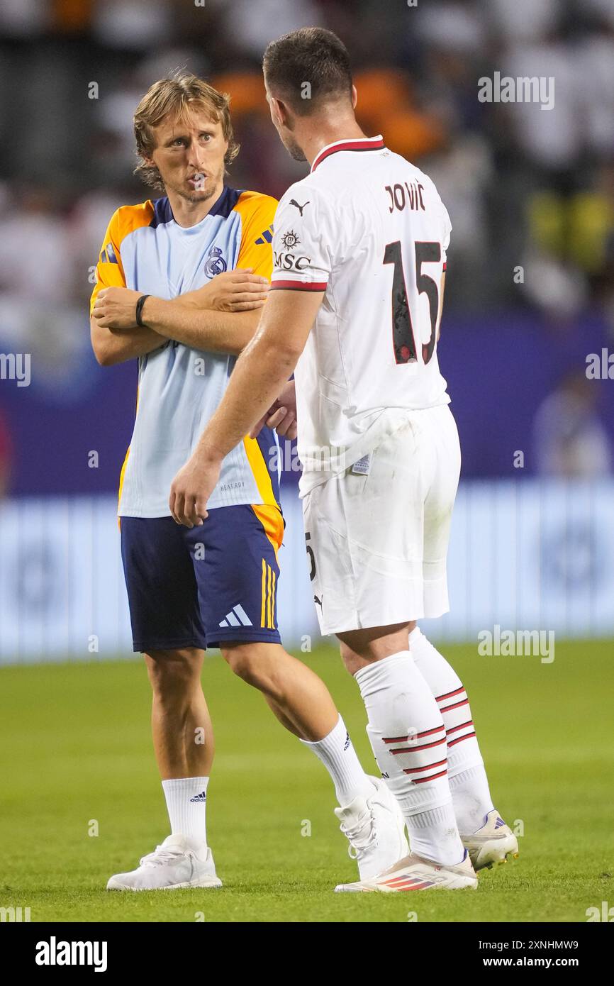 Chicago, United States. 31st July, 2024. Real Madrid midfielder Luka Modric  (10) has a conversation with AC Milan midfielder Luka Jovic (15) after the  international club friendly between AC Milan and Real, image size:866x1390