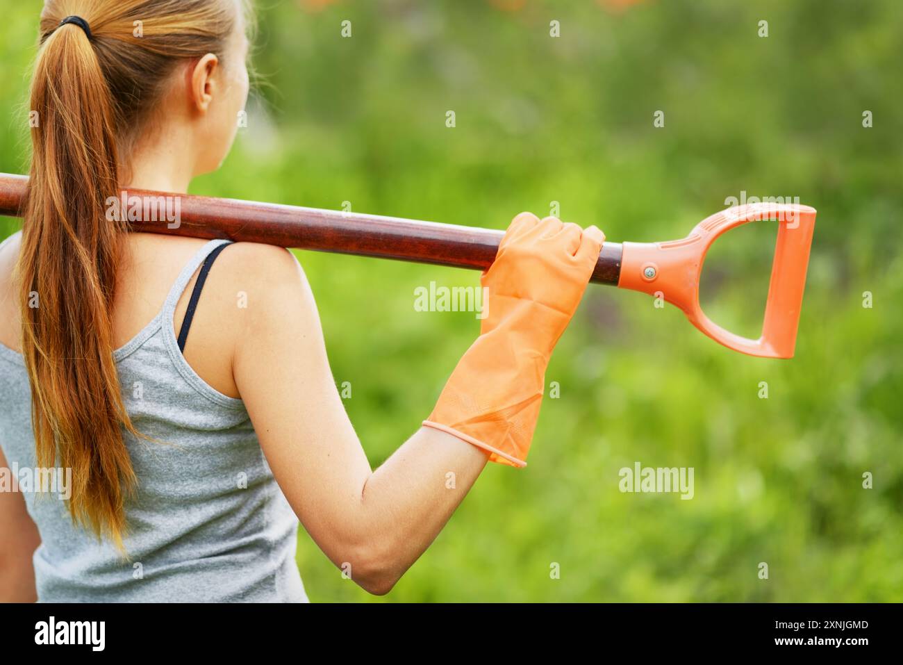Woman rake shovel on hi-res stock photography and images - Alamy