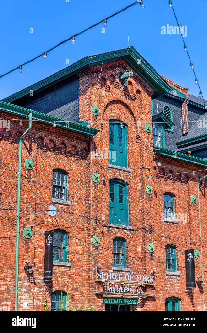 Toronto, Canada - July 29, 2024: Colonial architecture building in the distillery district - a famous place in the old town. Stock Photo