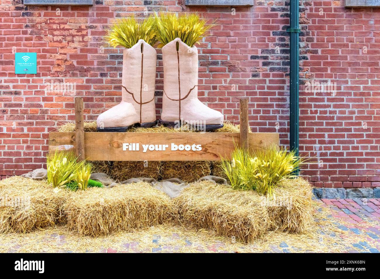 Toronto, Canada - July 29, 2024: Decoration of boots for the country music festival Picks and Bricks in the distillery district. Stock Photo