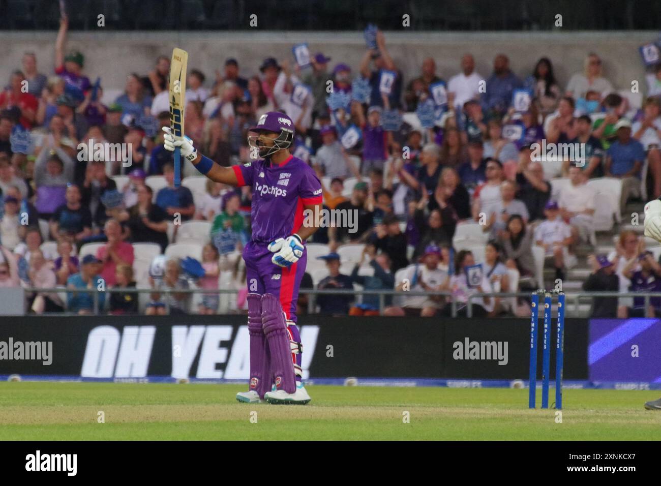 Leeds, 30 July 2024. Nicholas Pooran batting for Northern Superchargers men raising his bat after reaching his half century against Southern Brave men in The Hundred at Headingley. Credit: Colin Edwards Stock Photo