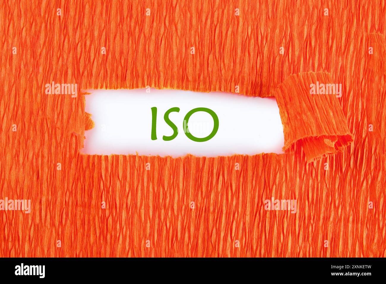 ISO service concept. ISO on white under the paper Stock Photo - Alamy