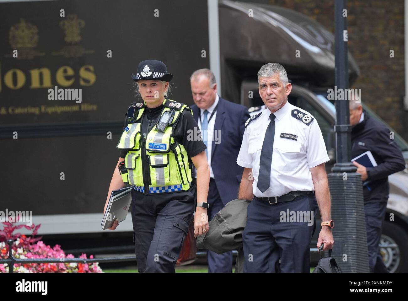 Chief Constable Andy Marsh (right), CEO, College of Policing, arrives ...