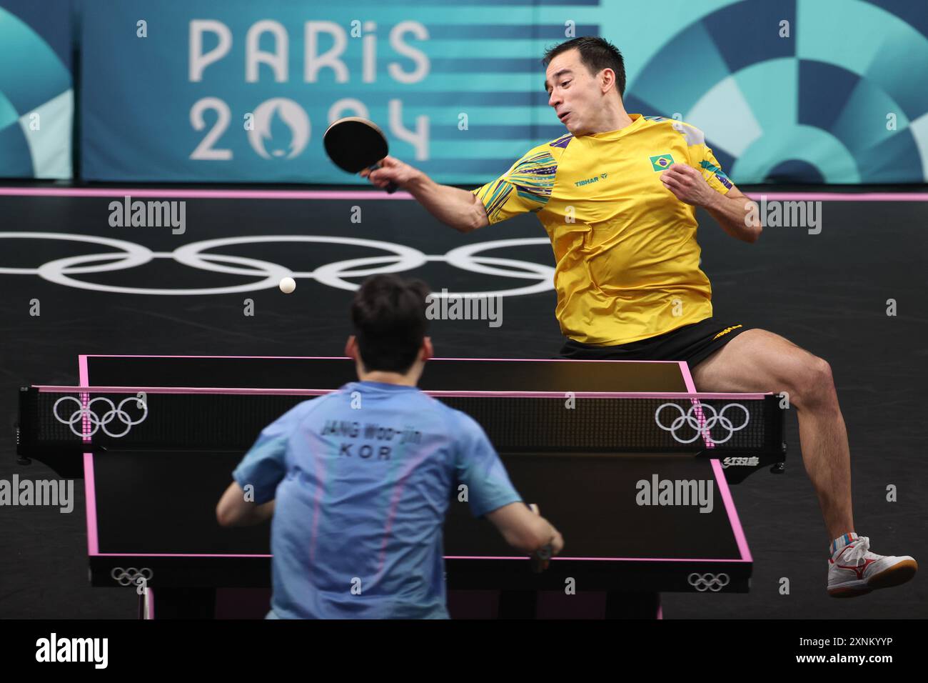 Paris, France. 1st Aug, 2024. Hugo Calderano (top) of Brazil competes ...