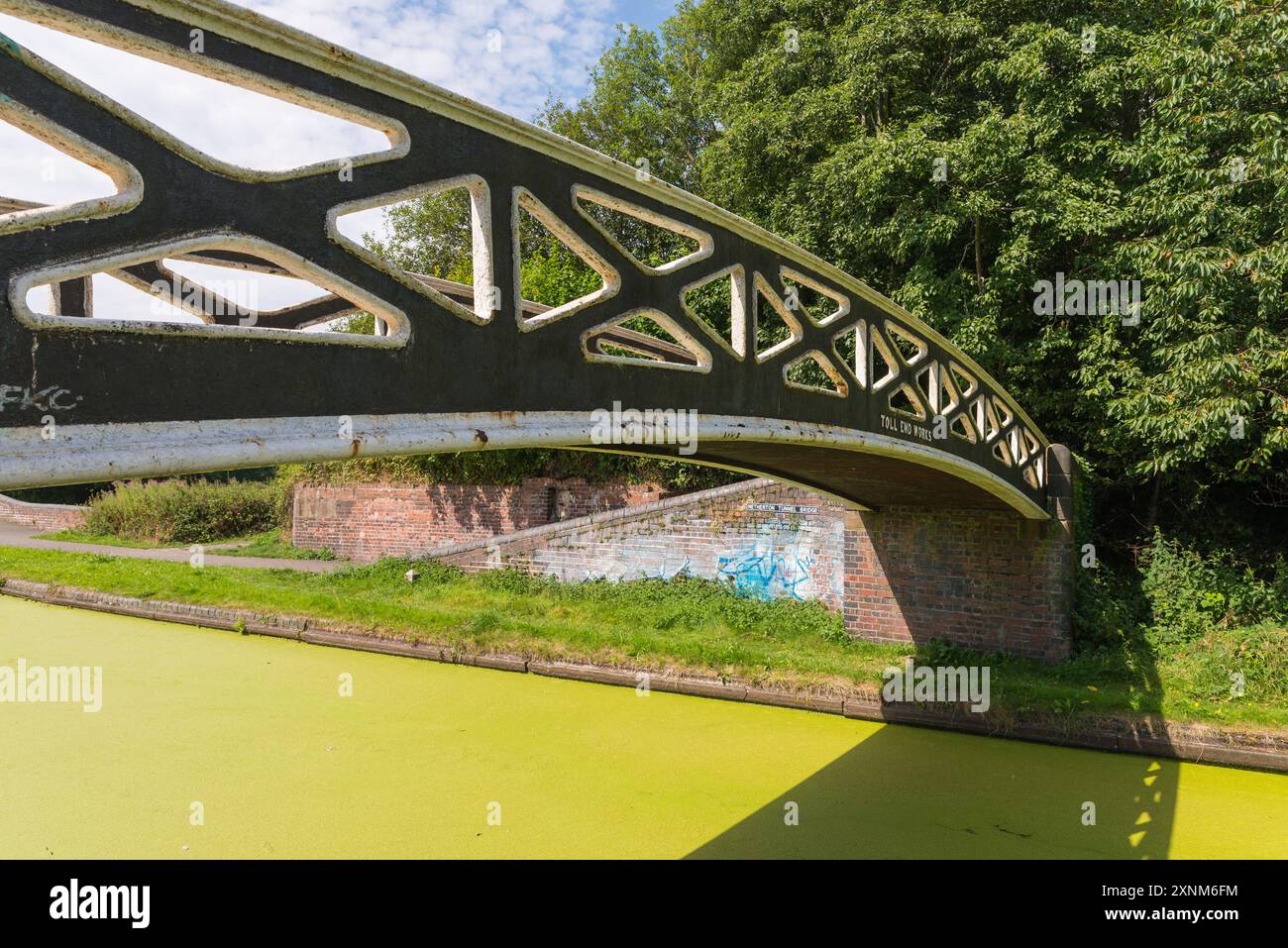 Toll End Bridge at Windmill End Junction on the Dudley canal named after Toll End Works where the structural ironwork bridge was made locally Stock Photo