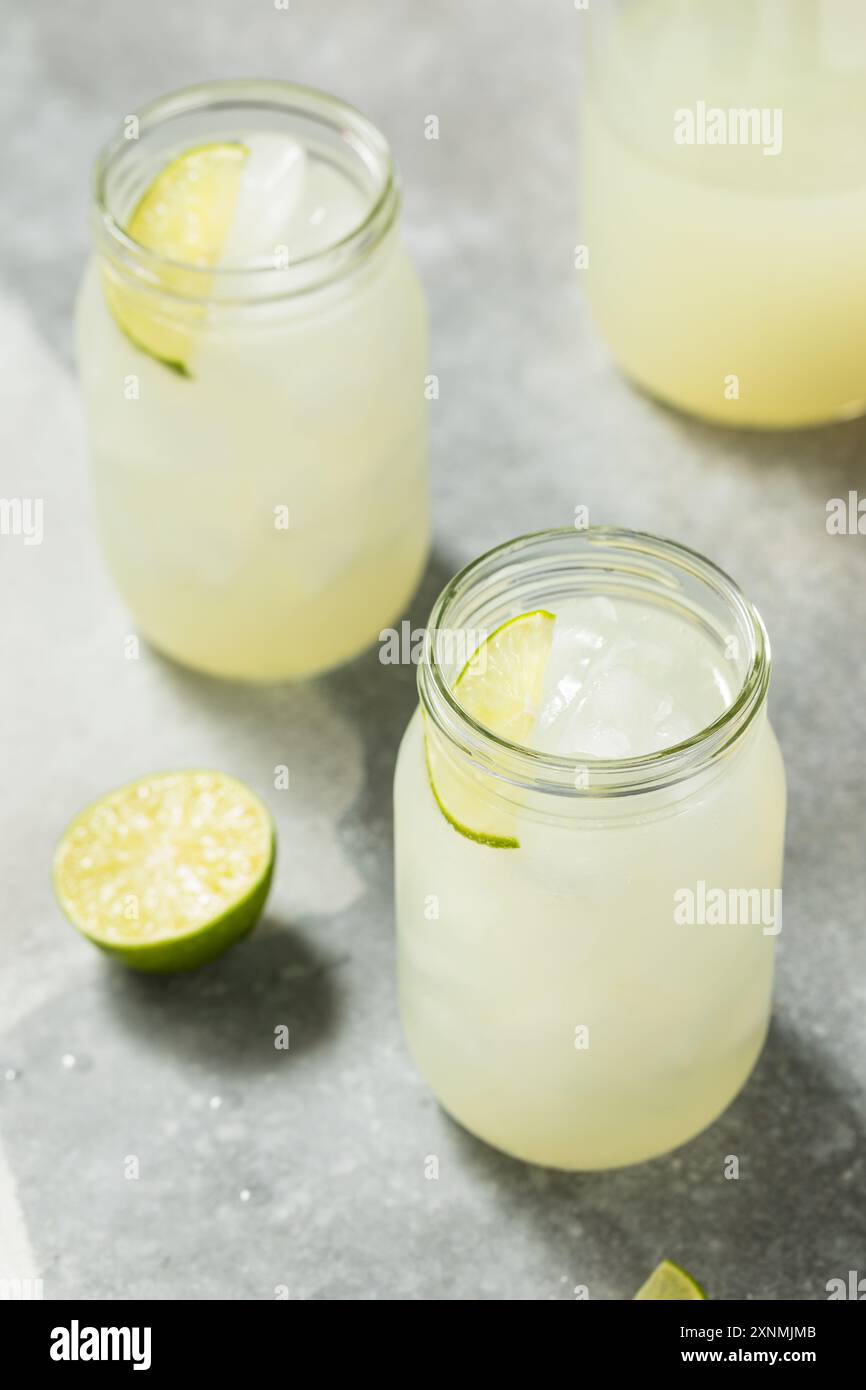 Cold Refreshing Lime Limeade with Sugar and Ice Stock Photo