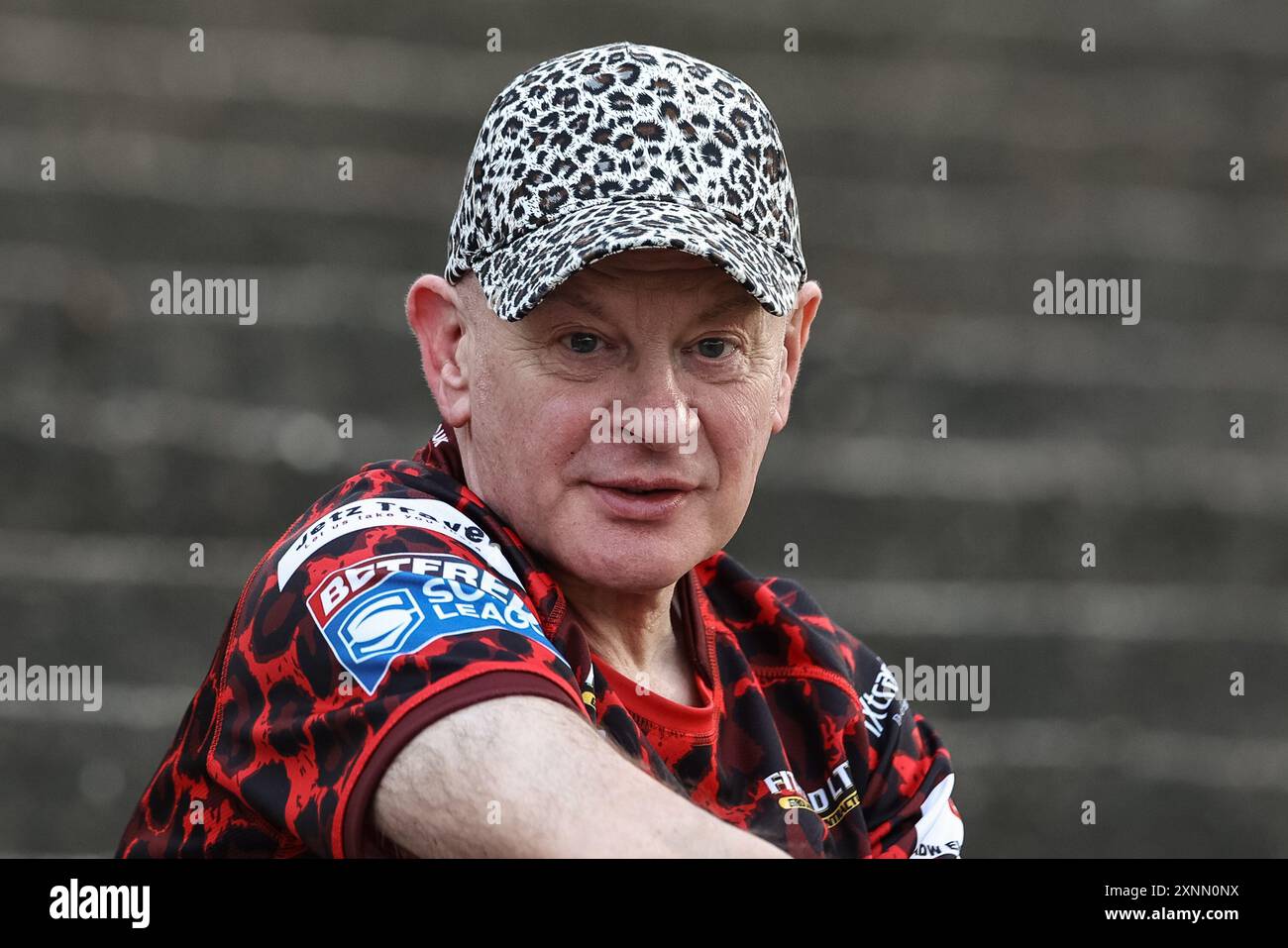 Castleford, UK. 01st Aug, 2024. A Leigh Leopards fan with a Leopard print baseball hat on during the Betfred Super League Round 20 match Castleford Tigers vs Leigh Leopards at The Mend-A-Hose Jungle, Castleford, United Kingdom, 1st August 2024 (Photo by Mark Cosgrove/News Images) in Castleford, United Kingdom on 8/1/2024. (Photo by Mark Cosgrove/News Images/Sipa USA) Credit: Sipa USA/Alamy Live News Stock Photo