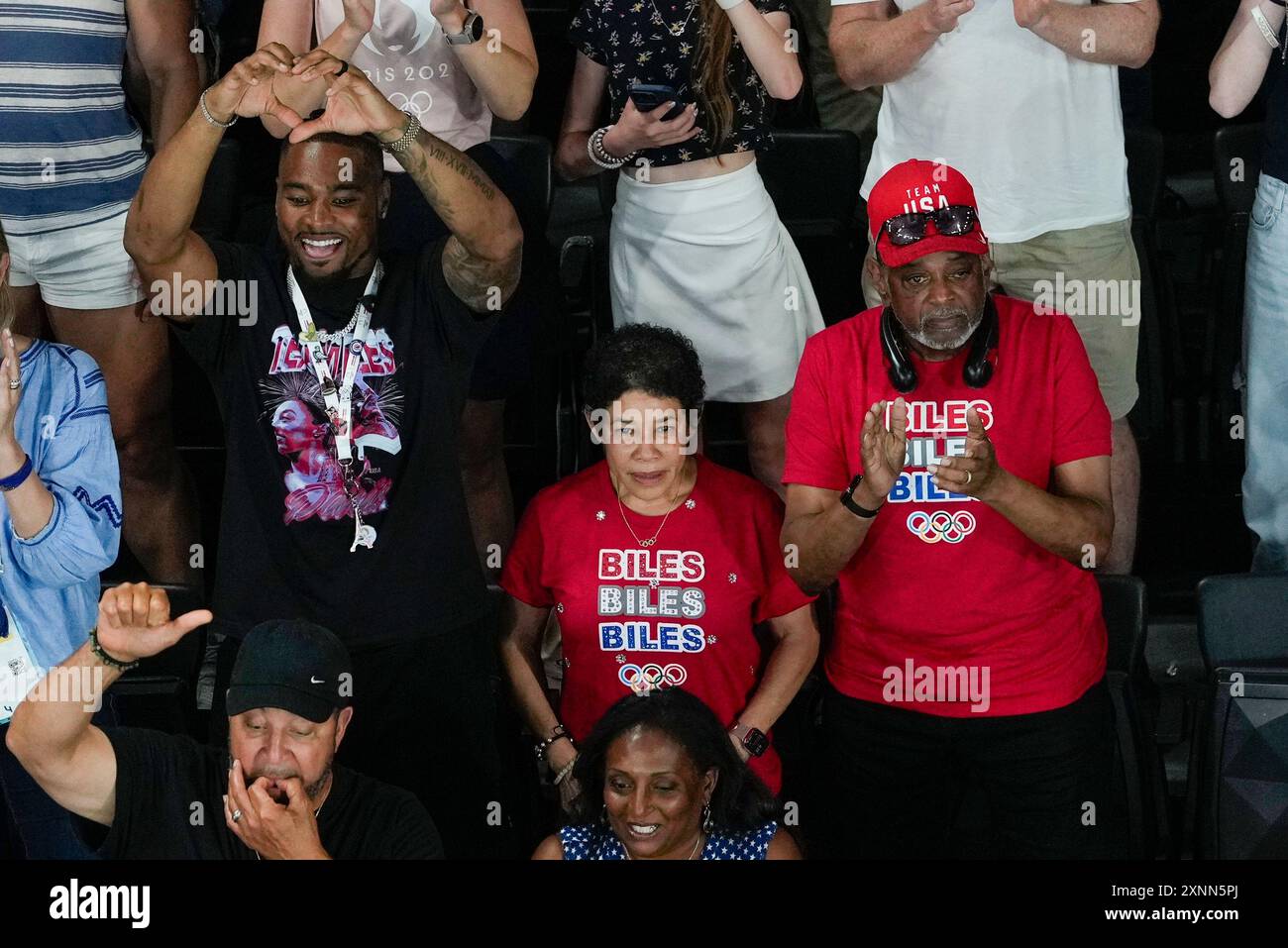 U.S. gymnast Simone Biles' husband Jonathan Owens, and her parents Ron