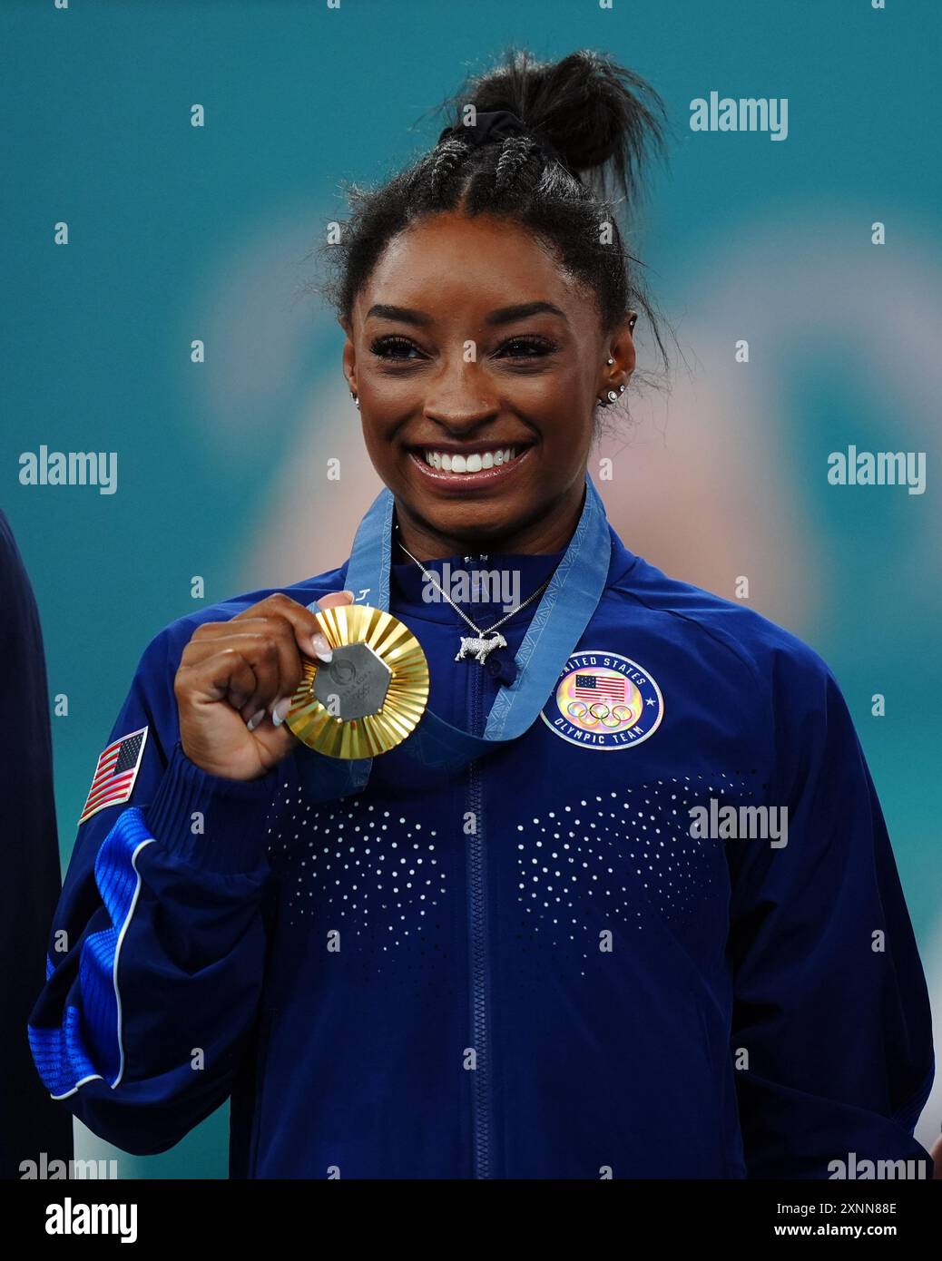 USA's Simone Biles with her gold medal, and sporting a silver goat ...