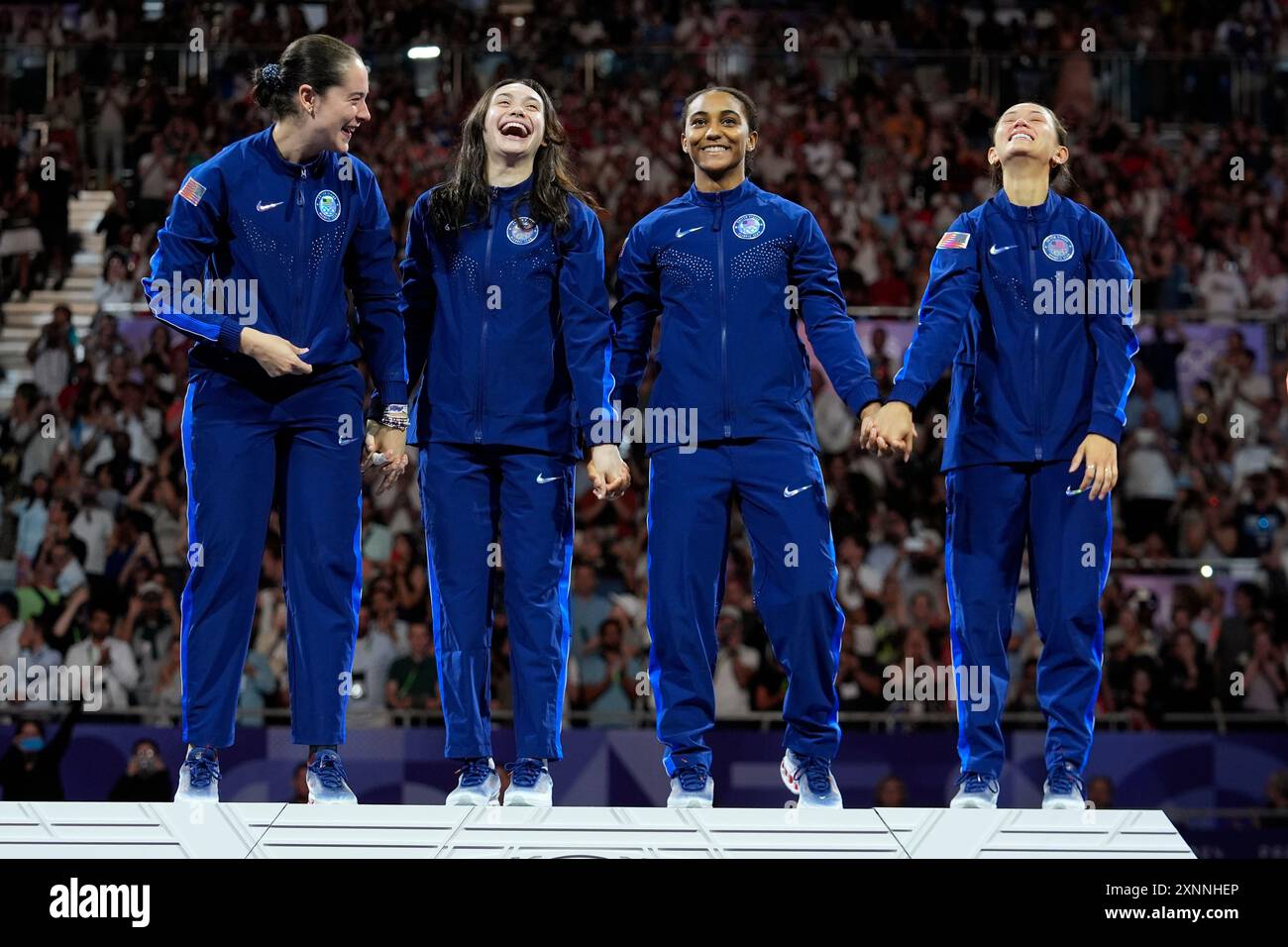 United States' fencer Lee Kiefer, Lauren Scruggs, Jaqueline Dubrovich ...
