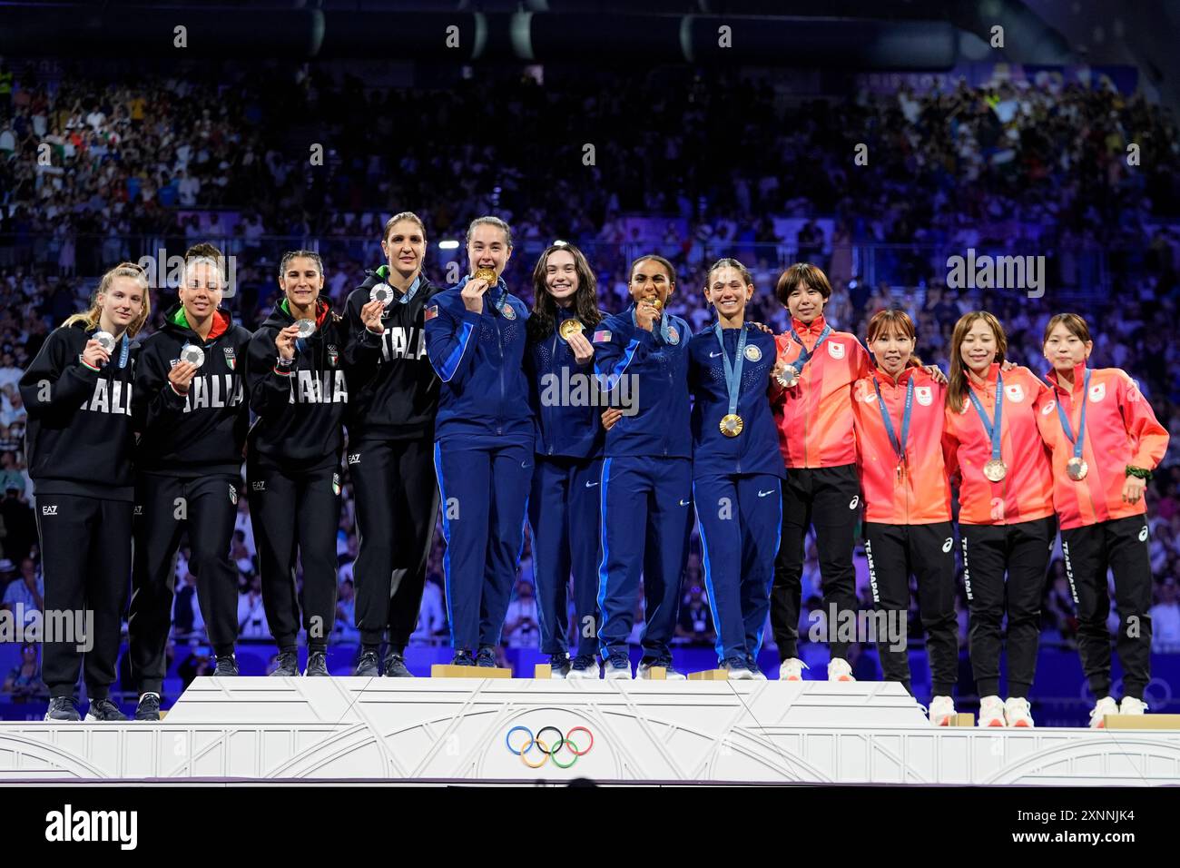 United States' fencers Lee Kiefer, Lauren Scruggs, Jaqueline Dubrovich ...