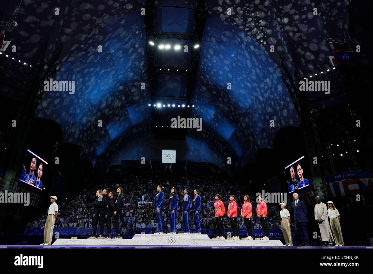 United States' fencers Lee Kiefer, Lauren Scruggs, Jaqueline Dubrovich ...
