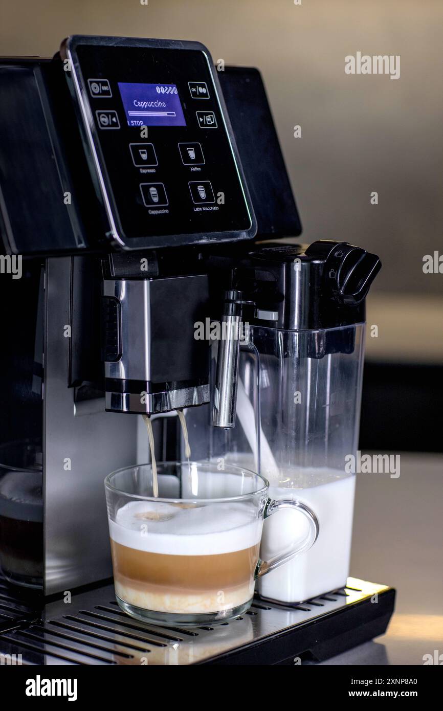 Modern coffee machine making cappuccino hi-res stock photography and ...