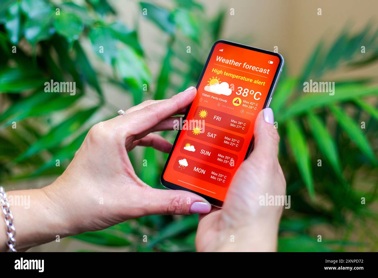 High Temperature Alert. Woman outdoors checking the weather forecast on ...