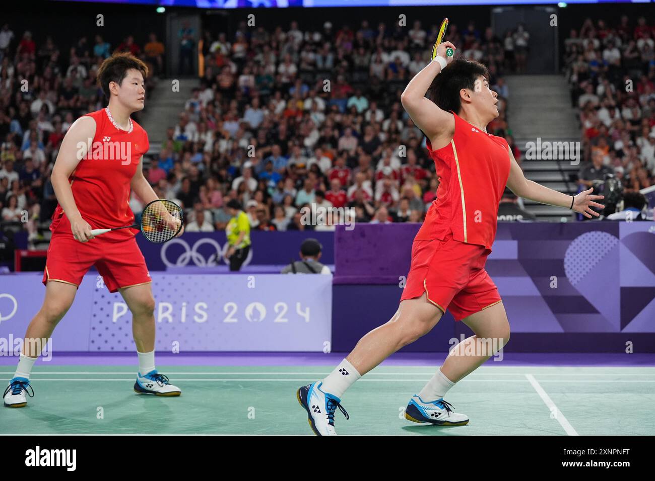 **CHINESE MAINLAND, HONG KONG, MACAU AND TAIWAN OUT** Chinese badminton players Liu Shengshu and Tan Ning defeated South Korean badminton players Baek Stock Photo