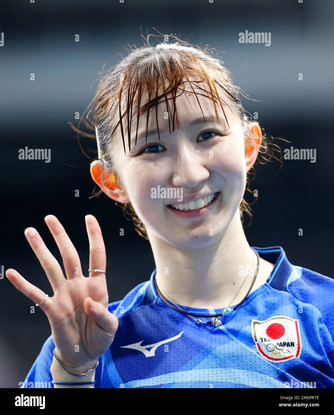 Japan's Hina Hayata smiles after defeating North Korea's Pyon Song ...
