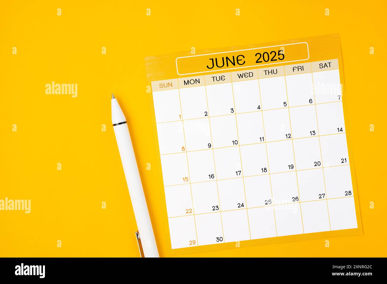 June 2025 Monthly calendar for 2025 year with pen on yellow color