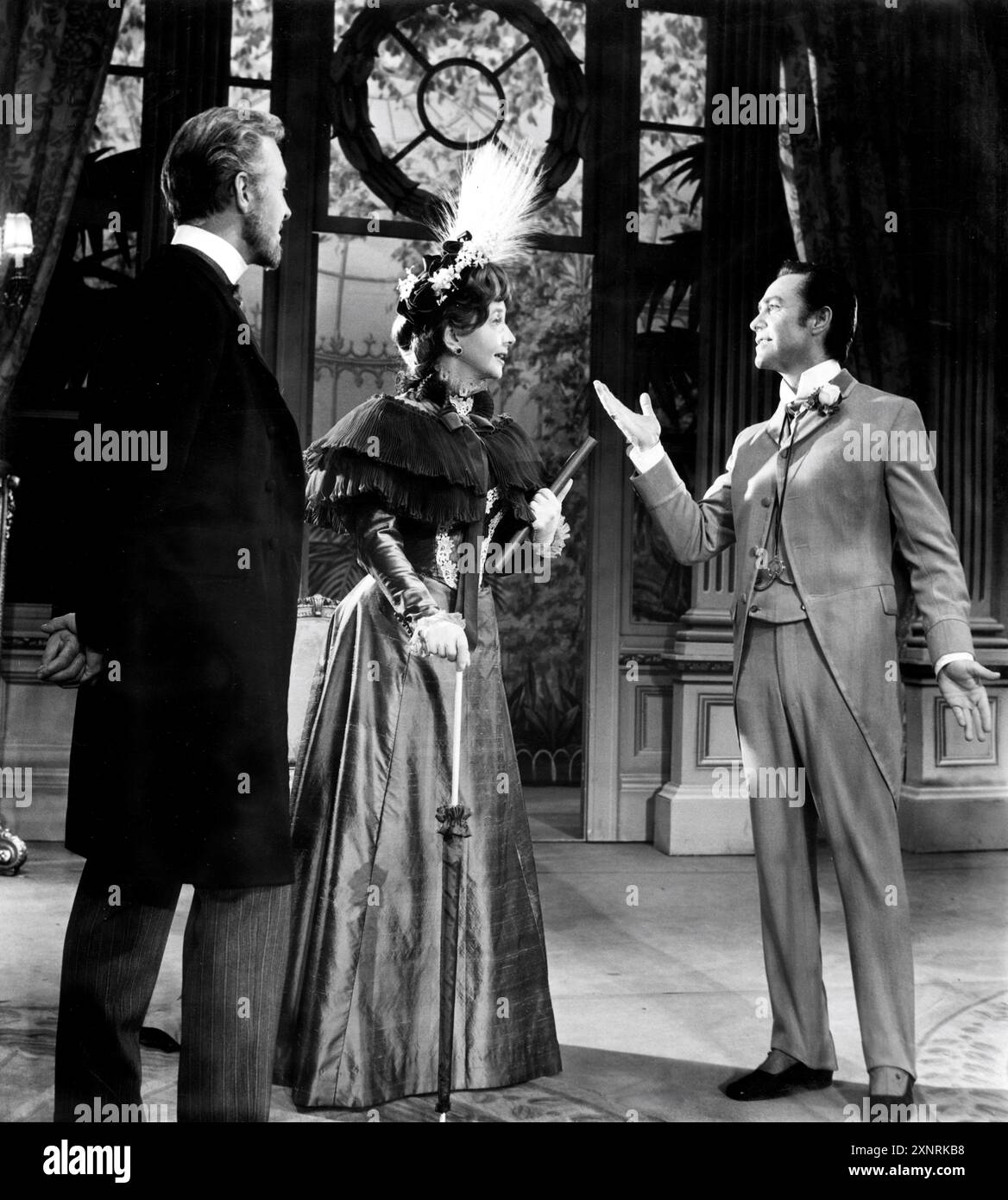 MICHAEL DENISON as Sir Robert Chiltern DULCIE GRAY as Lady Chiltern and RICHARD TODD as Lord Goring in the 1965 London production at the Strand Theatre of AN IDEAL HUSBAND play by Oscar Wilde director James Roose-Evans designed by Anthony Holland Stock Photo