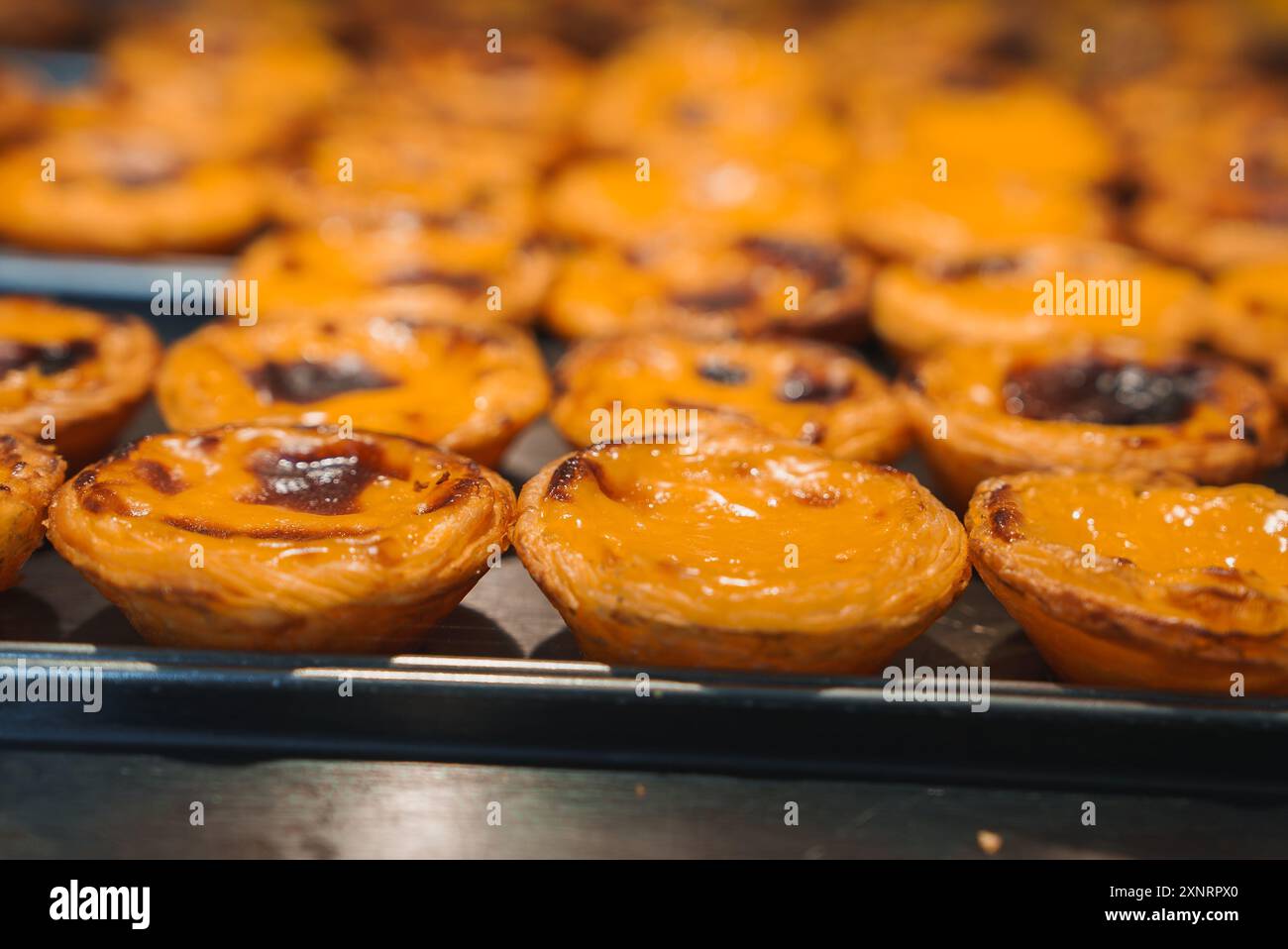 Close-Up of Freshly Baked Pastel de Nata in Lisbon, Portugal Stock Photo