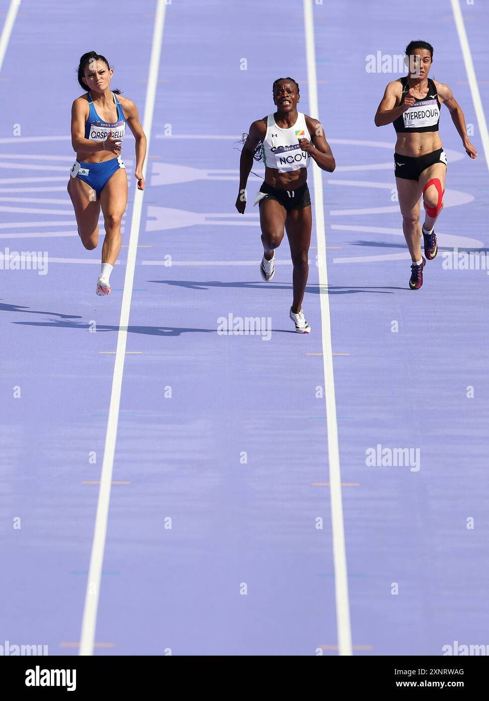 Paris, France. 2nd Aug, 2024. Natacha Ngoye (C) of Congo sprints during the women's 100m preliminary round of Athletics at the Paris 2024 Olympic Games in Paris, France, Aug. 2, 2024. Credit: Li Jing/Xinhua/Alamy Live News Stock Photo