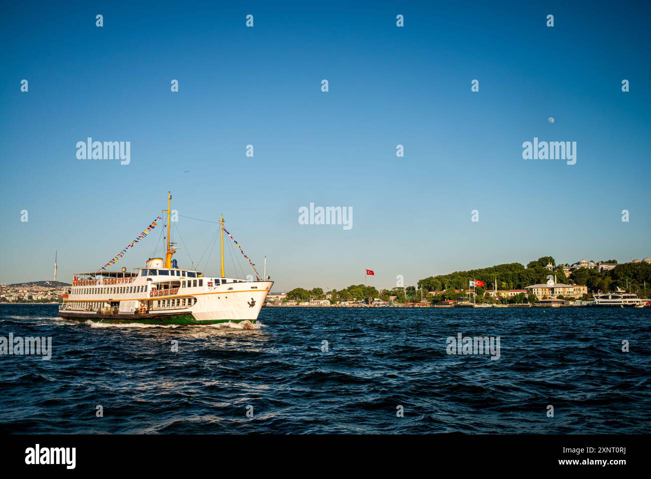 A picturesque view of the Bosphorus in Istanbul, featuring a passenger ...