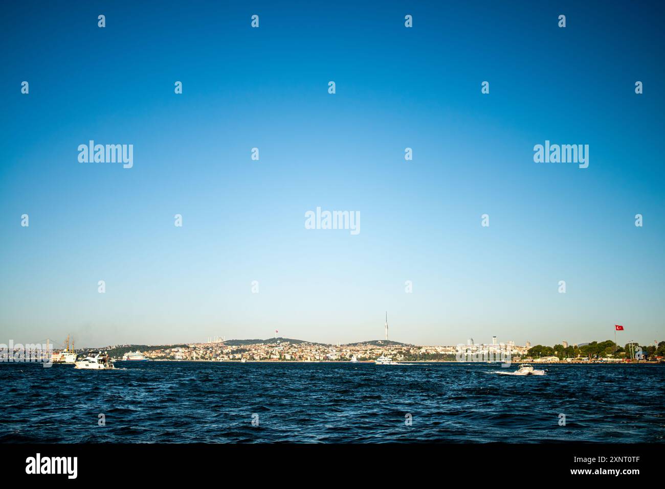 A picturesque view of the Bosphorus in Istanbul, featuring a passenger ...