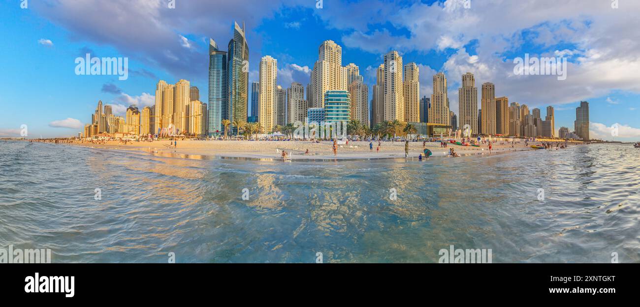 A picturesque view of a city with tall buildings in the background and ...