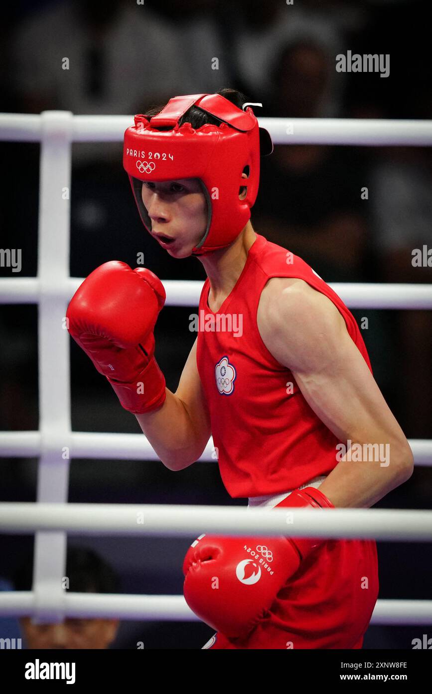 Chinese Taipei's controversial boxer Lin Yu-ting ( in red ) won her ...