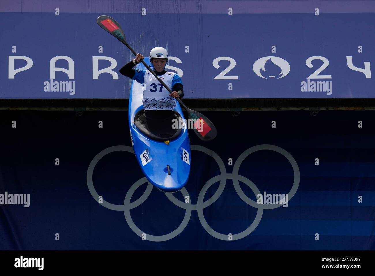 Li Shiting of China competes in the women's kayak cross time trial at ...