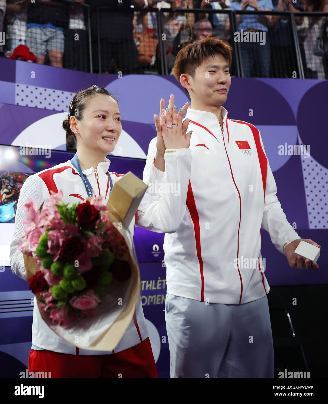 Paris, France. 2nd Aug, 2024. Gold medalist Huang Yaqiong (L) of China