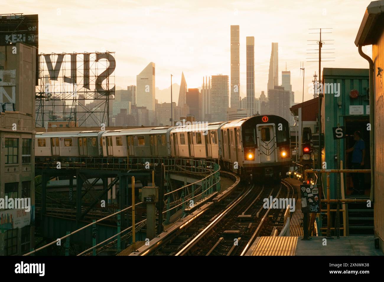 7 Train approaching at sunset, at Queensboro Plaza Station, Queens, New ...