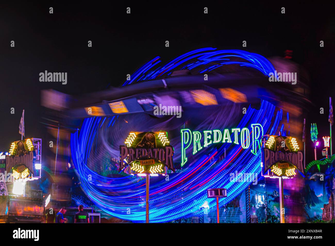 Predator overhead ride in motion, night shot, Oktoberfest, Festwiese, Theresienwiese, Munich, Upper Bavaria, Bavaria, Germany Stock Photo