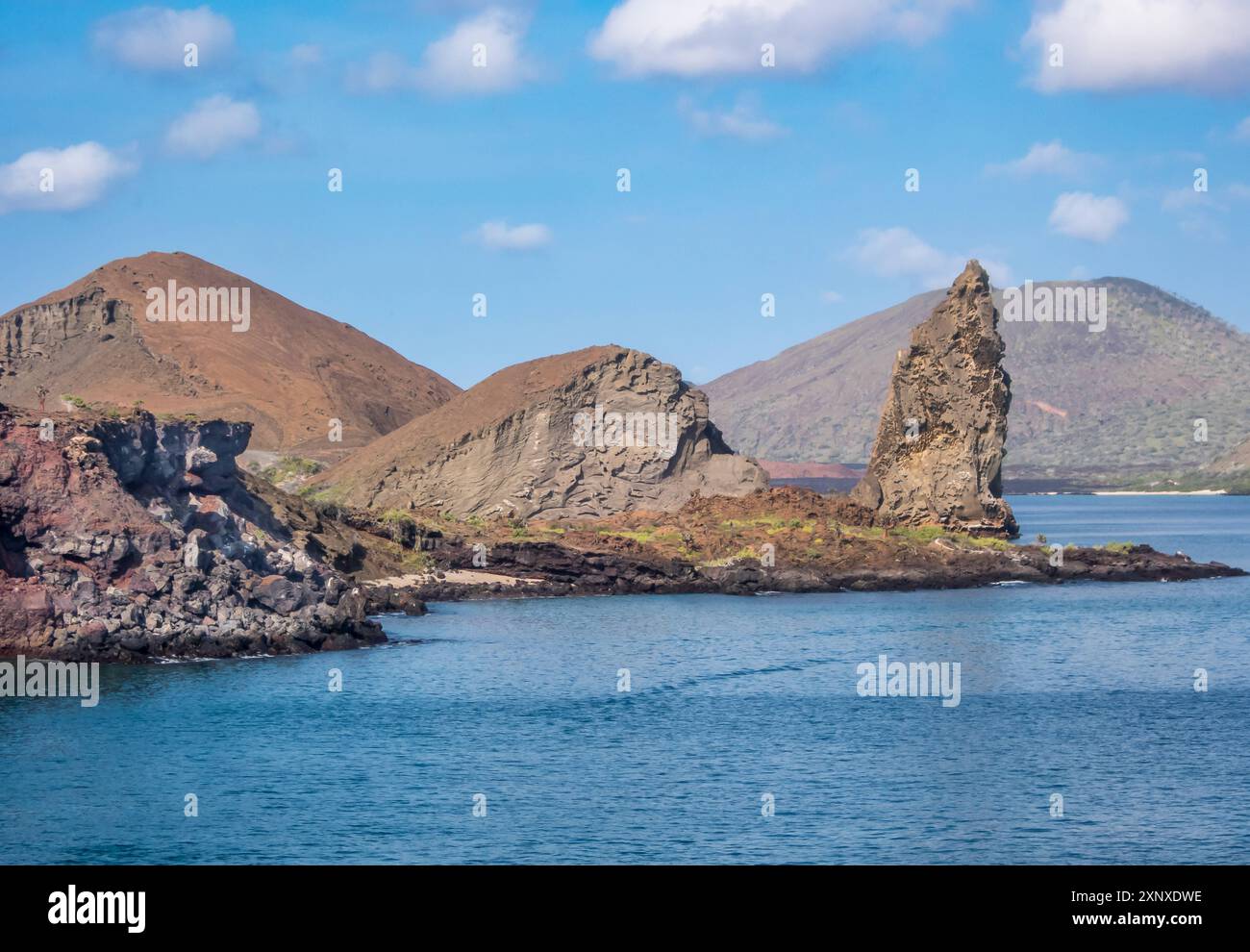 Pinnacle Rock, a volcanic plug on Bartolome Island, one of the most spectacular features of the Galapagos islands, UNESCO World Heritage Site, Ecuador Stock Photo