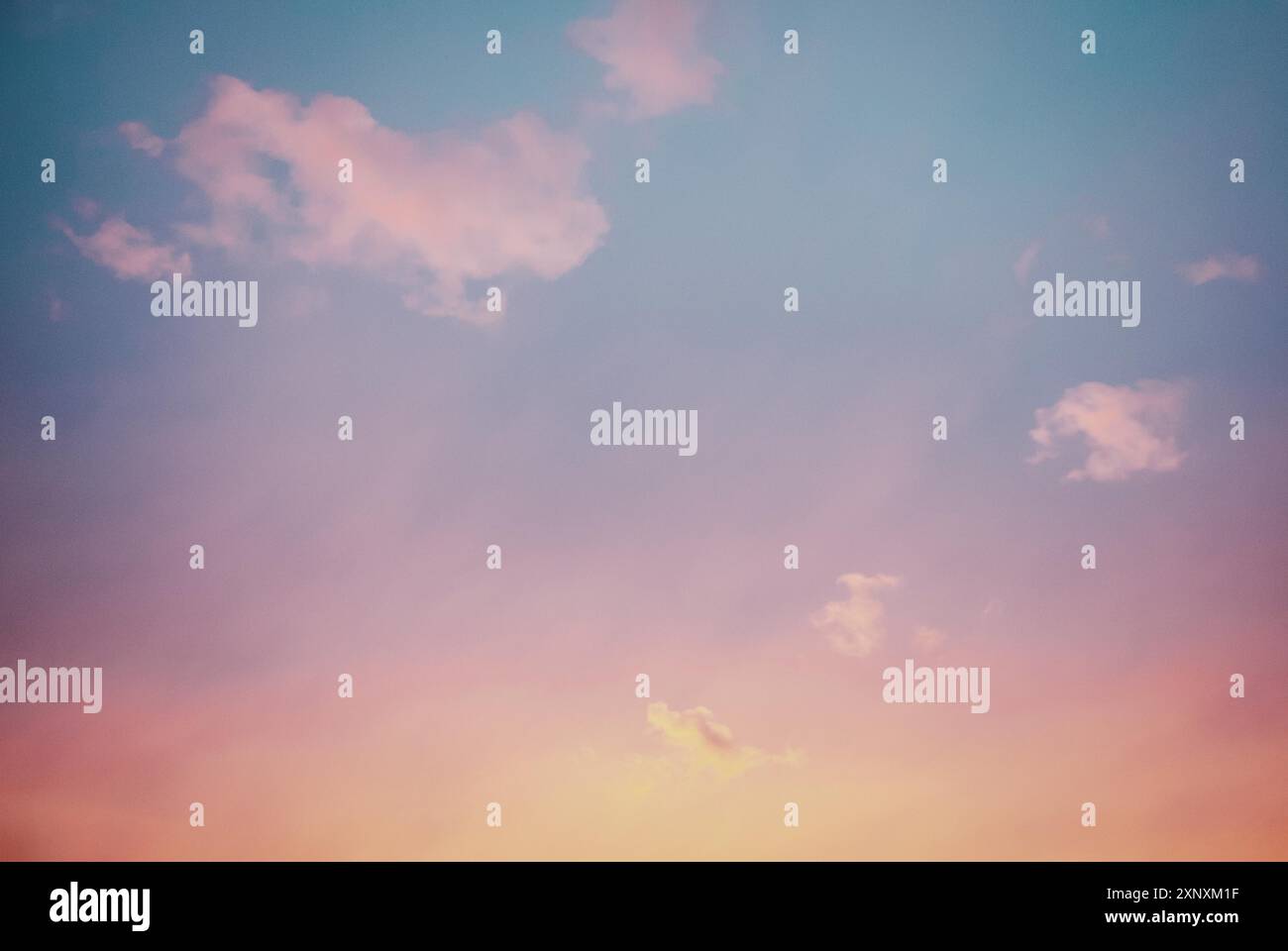 Sunset sky with few purple clouds, sky only background Stock Photo