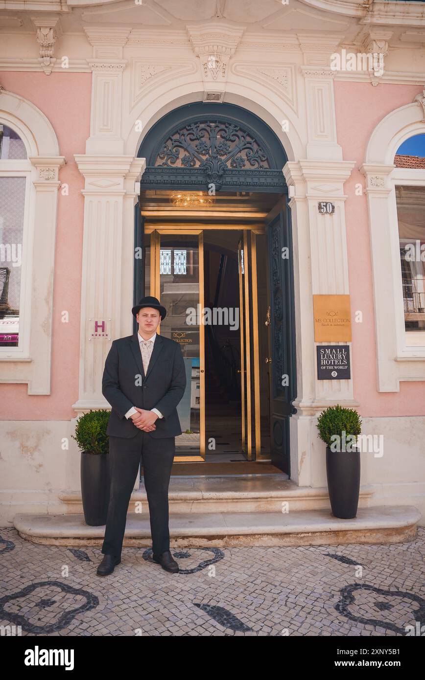 Elegant Entrance of Small Luxury Hotels of the World with Doorman at 50 Stock Photo