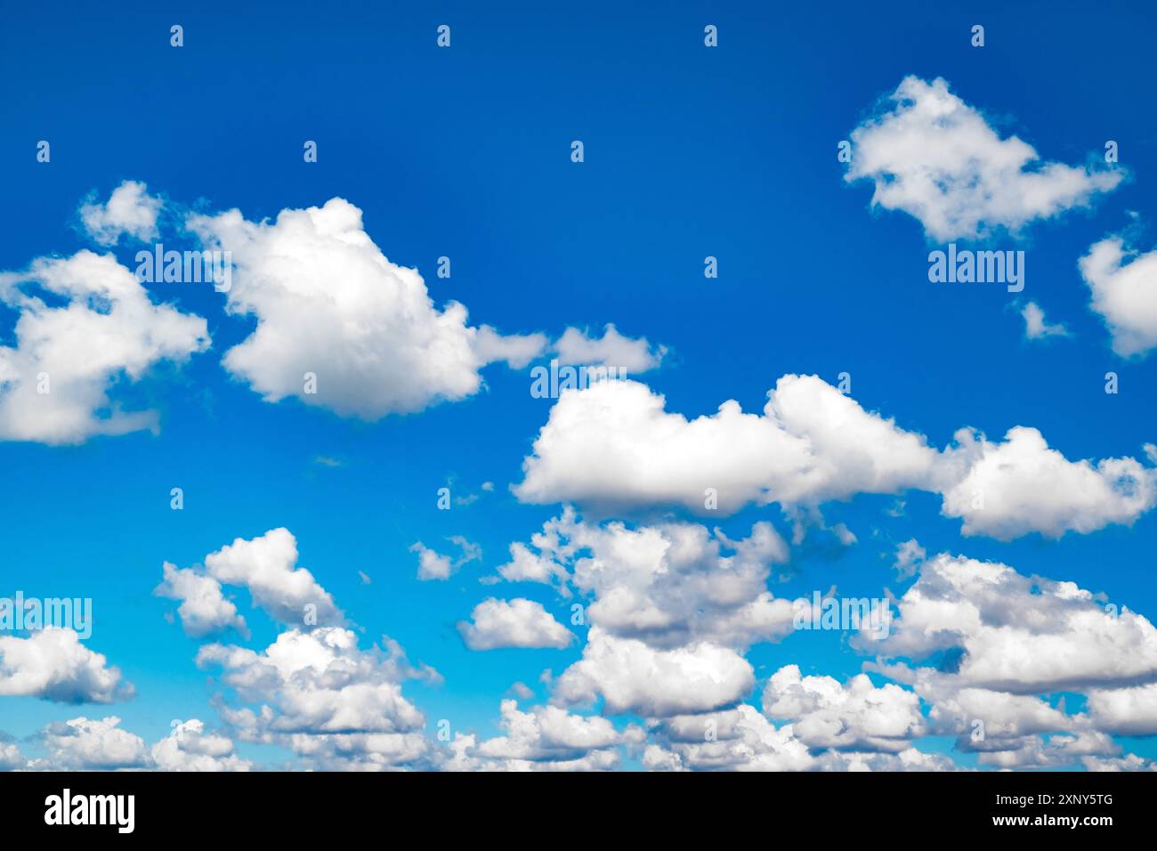 blue sky with white cumulus clouds on clear day Stock Photo - Alamy