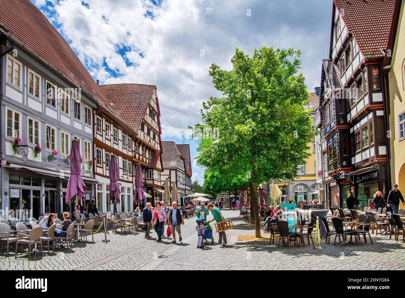 Baeckerstrasse with typical town houses and street cafes in the old town, Hameln, Oberweser, Weser, Weserbergland, German Fairytale Route, Lower Stock Photo