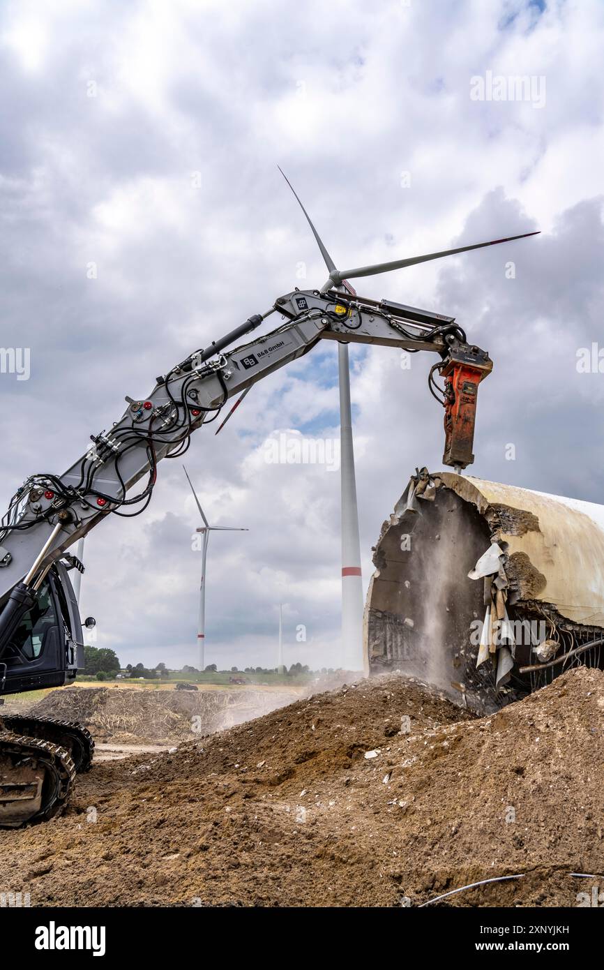 Demolished tower of a 20 year old wind turbine, in the Werl wind farm ...