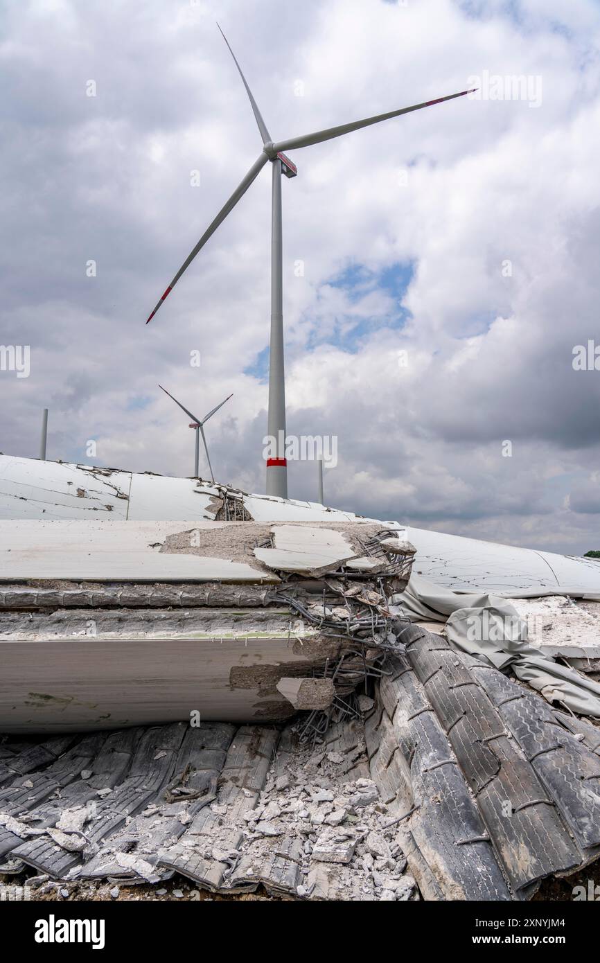 Demolished tower of a 20 year old wind turbine, in the Werl wind farm ...